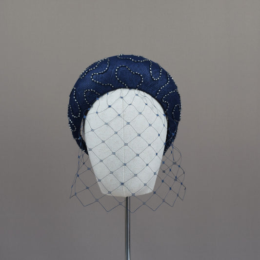 Navy Straw Wedding Guest Headband with silver beaded overlay.