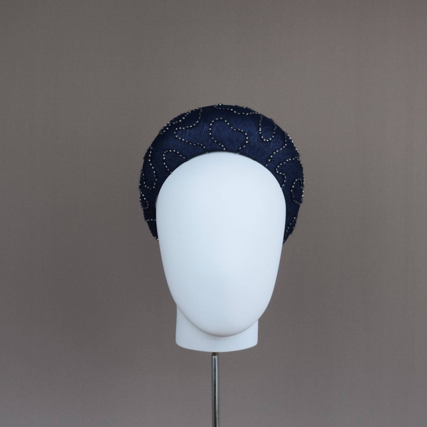 Navy Straw Wedding Guest Headband with silver beaded overlay.