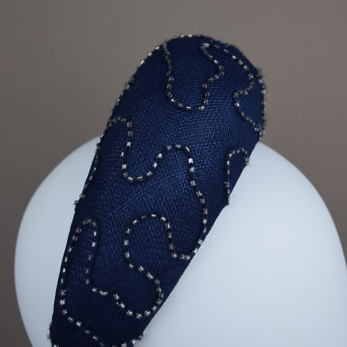 Navy Straw Wedding Guest Headband with silver beaded overlay.