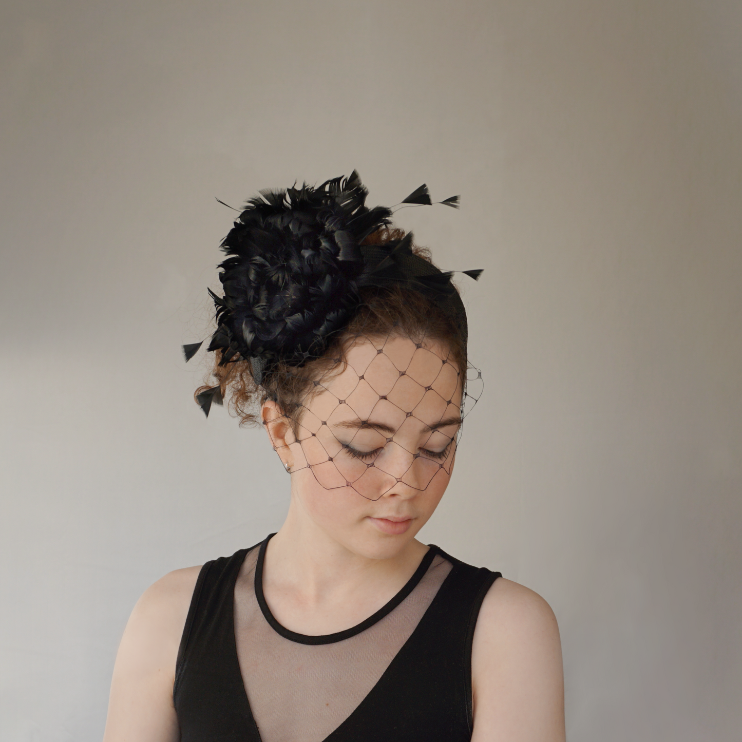 Black Straw Wedding Guest Headband with feather floral detail